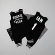 Load image into Gallery viewer, "Rookie of the Year" Football First Birthday Romper with Striped Cuff
