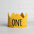 Load image into Gallery viewer, Gold knitted crown with ONE in black script lettering and gold accents