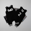 Load image into Gallery viewer, Black "Two" Racecar Second Birthday Romper with Striped Cuff