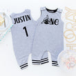 Load image into Gallery viewer, Gray "One" Airplane Themed Birthday Romper with Striped Cuff