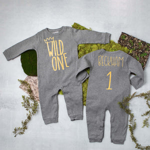 Black Long Sleeve Wild One First Birthday Romper with Gold Design