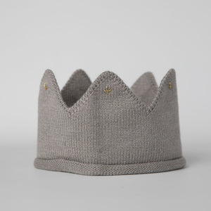 Gray knitted crown with gold accents