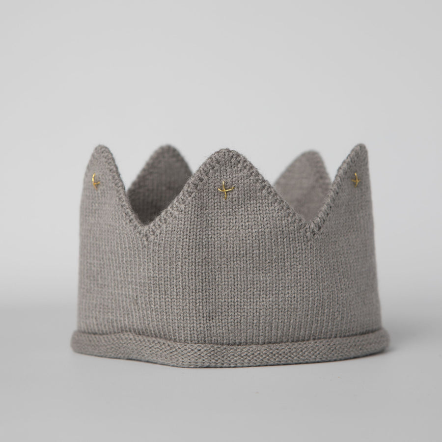 Gray knitted crown with gold accents