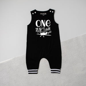 "One Year Has Flown By" Airplane First Birthday Romper with Striped Cuff