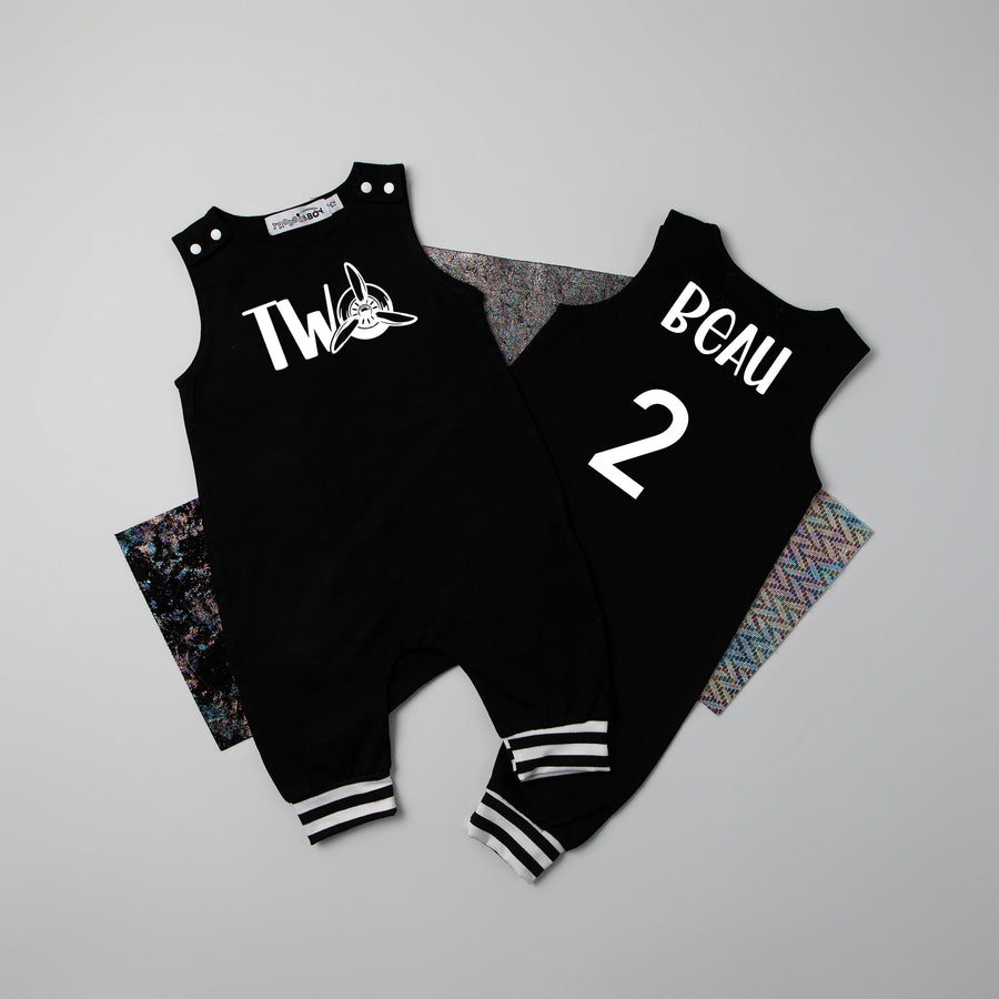 Black "Two" Airplane Second Birthday Romper with Striped Cuff