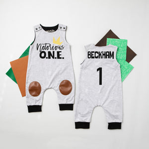 "Notorious One" First Birthday Romper with Knee Patches